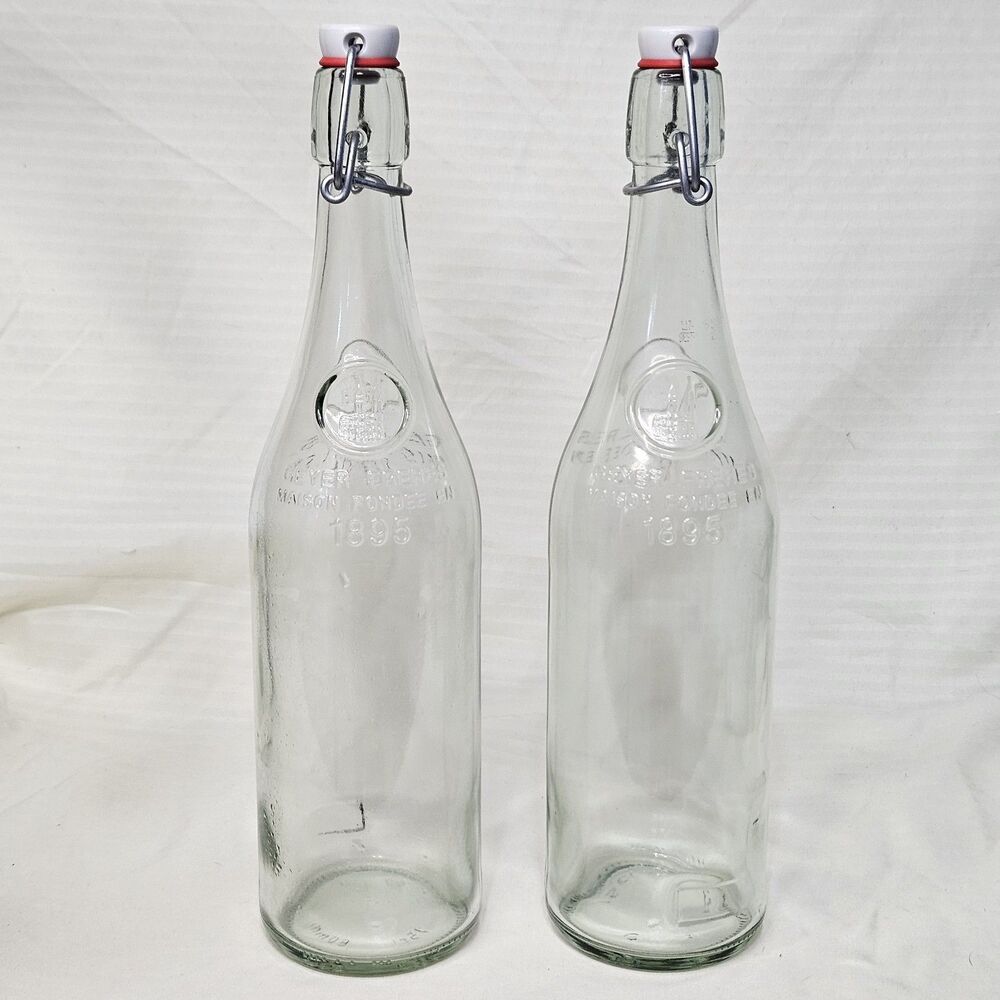 Geyer Freres Maison Fondee En 1895 Swing Top Glass Bottles Set  Of 2  Vintage